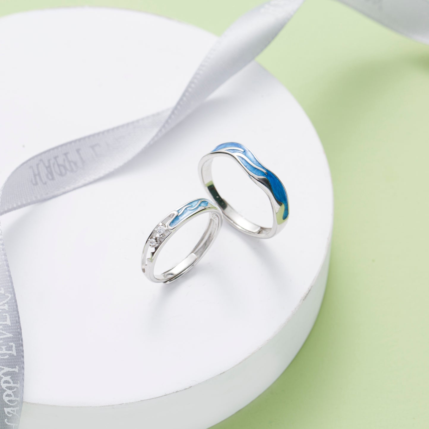 Blue Waves CZ Silver Couple Rings
